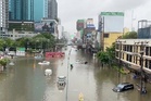 Heavy rain and flooding in Bangkok disrupts traffic and prompts evacuations