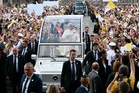 Pope Leo attracts 700,000 people as he parades through Paris before outdoor Mass