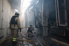 Russian strikes kill 2 in Ukraine after Moscow rejects German calls to de-escalate