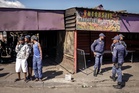 At least 17 dead in mass shooting at bar in South Africa, police say