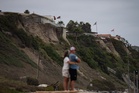 Sea level rise is reshaping a California beach town and threatening a key rail line