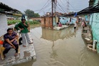Heavy rain and flooding kill at least 62 in northern India