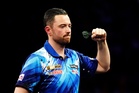 Luke Humphries battles past Dave Chisnall at World Grand Prix
