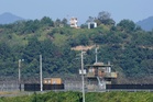 North Korea test-fires missile as tensions grow over border mine blasts