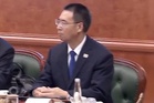 Mysterious figure alongside Xi Jinping identified after years of speculation – thanks to White House guestlist