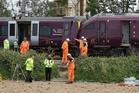 Train ‘sped up after acknowledging red signal’ before Bedford crash – report