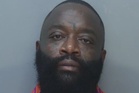 Rick Ross charged with battery related to domestic violence accusation