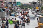 Thailand braces for more rain as death toll from recent flooding hits 31
