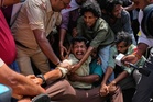 Cockroach protests return to India as thousands demand removal of election chief