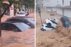 Huge flood flips cars and rips through Spain holiday hotspot