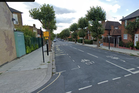 Police launch manhunt after mourner shot dead at memorial service in London