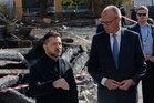 Russia intensifies strikes on Kyiv as German Chancellor arrives to pledge support