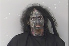 Bizarre mugshot shows ‘demonologist’ accused of tracking women by their phones