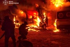 Russia says nearly 900 Ukrainian drones downed and Moscow region fuel depot reportedly burns
