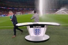 Ian Wright and Roy Keane drenched by Wembley sprinklers during live England broadcast