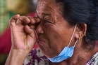 Nepal ends search for thousands of flood victims as family reactions range from anger to relief