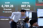 Asian shares decline under pressure from rising bond yields and surging oil prices