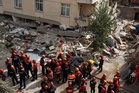 Istanbul flat collapse leaves two dead as rescuers search for survivors