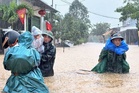 Vietnam mobilizes troops after heavy rains trigger flash floods and raise risks of landslides