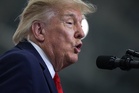Trump sparks outrage for posting AI video of himself wrestling Yorkshire tiger that killed a man