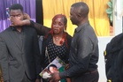 An increase in killings of women in Cameroon spurs protests and demands for better laws