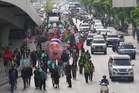IMF-World Bank meetings draw modest protests in Bangkok over growing inequality