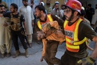 Photos show deadly school roof collapse in Pakistan