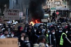 France protests live: Macron says ‘no place for violence’ as 400 arrested after clashes with police