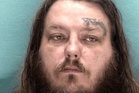 Couple charged with endangerment after children found 'locked in cages'