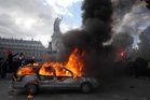 Violent protests in France as police battle demonstrators, in photos