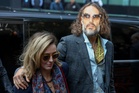 Russell Brand trial told comedian had ‘big grin’ like a ‘clown’ before alleged rape