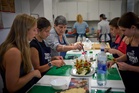 Barcelona 'grandmas' dish out cooking wisdom. And find nourishment themselves