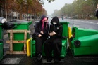 Photos of youth around the world protesting for education, housing and political change