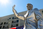 Statue of melting Ron DeSantis unveiled taking aim at climate change denial