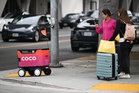 Battle over Chicago's delivery robots reaches the courts after outcry over alleged face scans