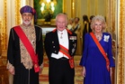 King praises William in banquet speech on day Harry speaks about royal family