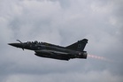 Fighter jet crashes and explodes into fireball in France with one dead and search launched for missing crew member
