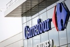 French supermarket chain suffers €1.6 billion hit after riots and looting