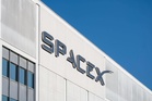 SpaceX lifts mood but hot inflation limits gains