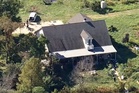 Texas deputy killed and police officer wounded while serving warrants at rural home