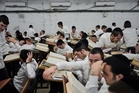 PHOTO ESSAY: Inside an elite ultra-Orthodox school as Israel's draft dispute looms over election