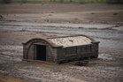Sunken village re-emerges from depths after summer of drought