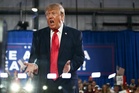 Trump mocks Michigan’s progressive and calls him a ‘jihadist’ as president campaigns in Iowa