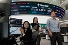 Asian shares slip as sharp drops for AI stocks overwhelm markets worldwide and oil prices jump