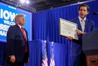 Trump presented with made-up ‘Man of the Century Award’ by Republican candidate at Iowa rally