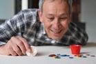Can he flick it? Yes he can – professor sees off tiddlywinks title challenger