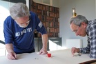 Cambridge University professor retains tiddlywinks world championship after ‘nail-biting’ seven-hour battle