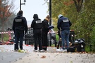Macron condemns ‘racist terrorist attack’ after one killed and five injured in Paris shootings