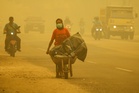 Indonesia cuts gas exports to Singapore amid row over haze