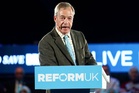 Reform tells councillors to do as little as possible in first 100 days – as Farage pledges the opposite